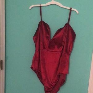 New with tags. Red velvet plus size body suit